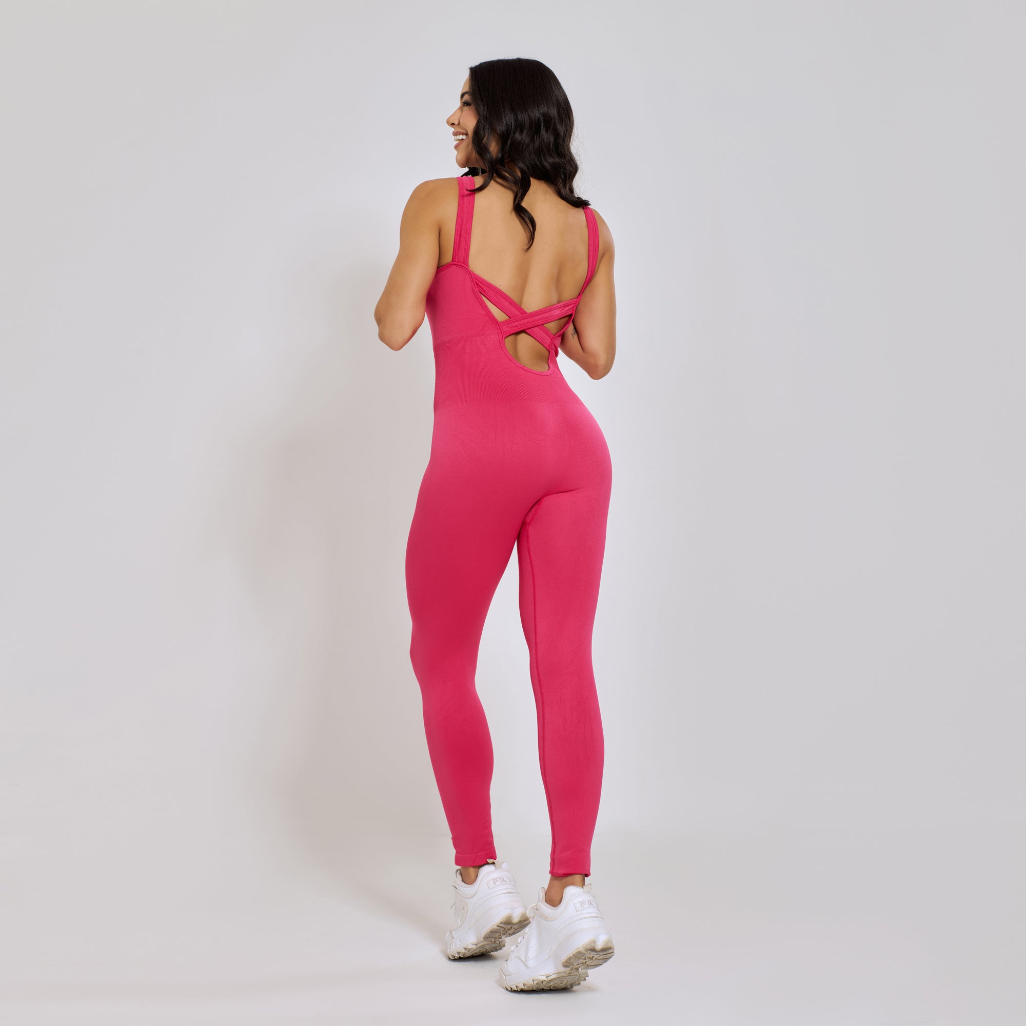 Nazzar Fit Seamless Cross‑Back Pink Fitness Jumpsuit